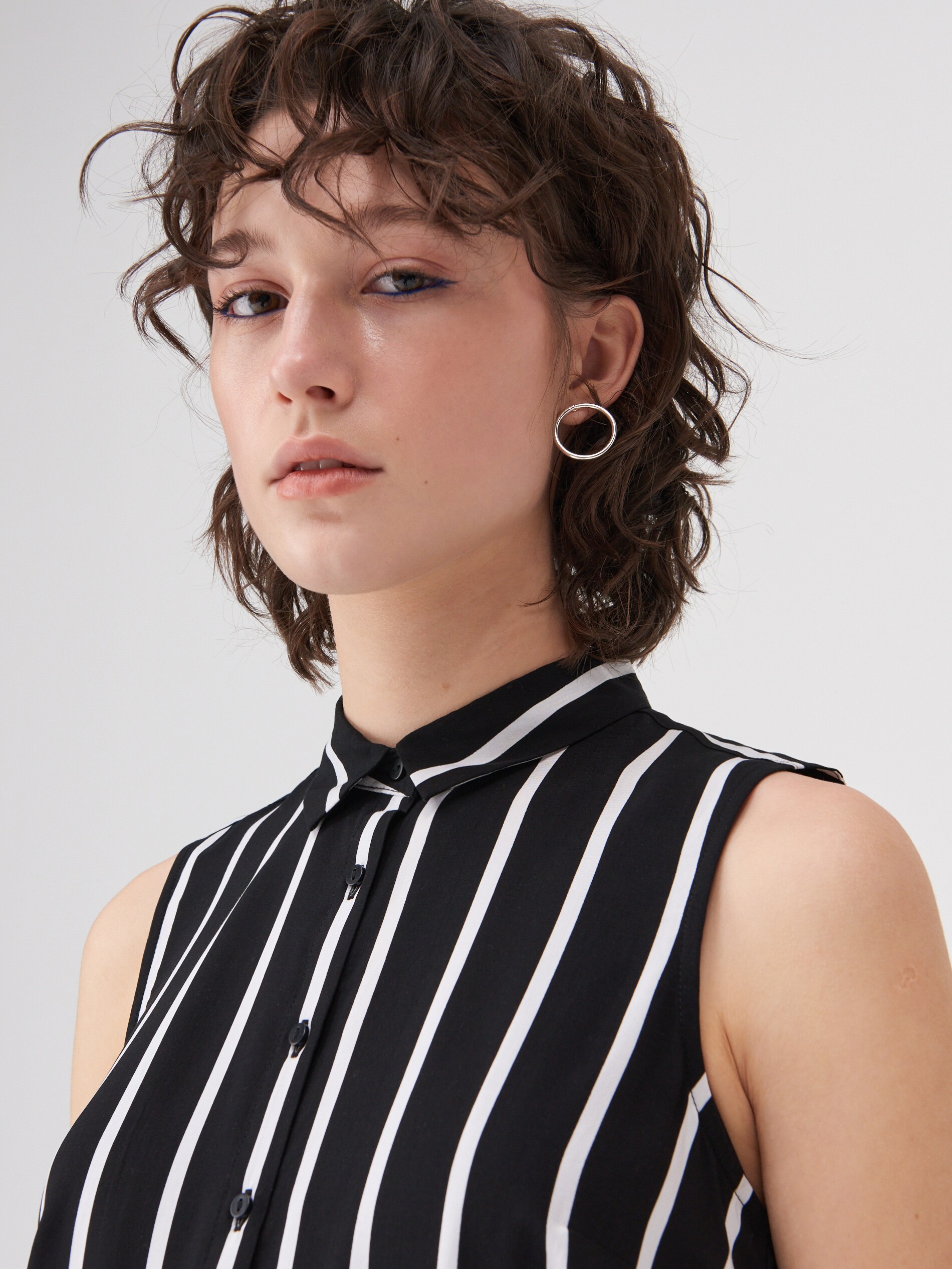 Košeľa bez rukávov