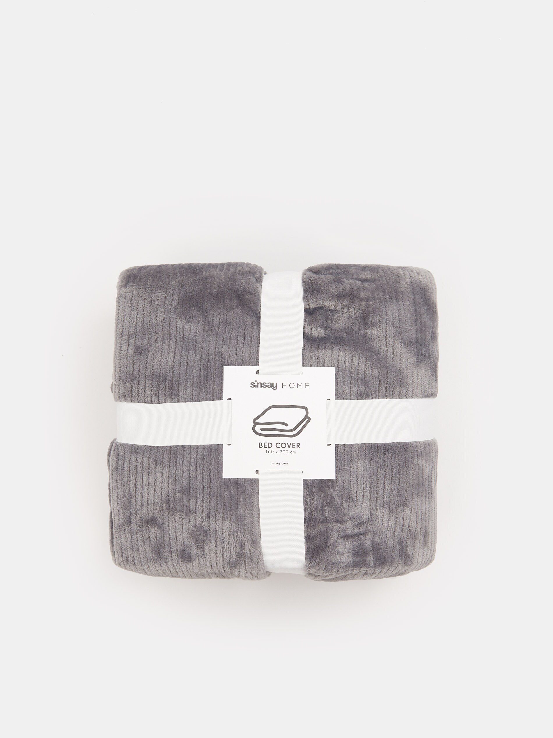 Prikrývka cez posteľ