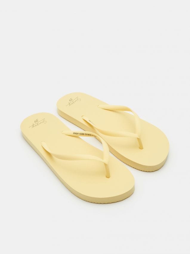 light yellow flip flops
